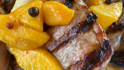 GRILLED PORK CHOPS WITH PICKLED PEACHES