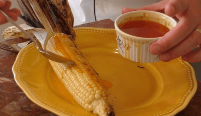 GRILLED CORN WITH CHILI BUTTER AND FETA