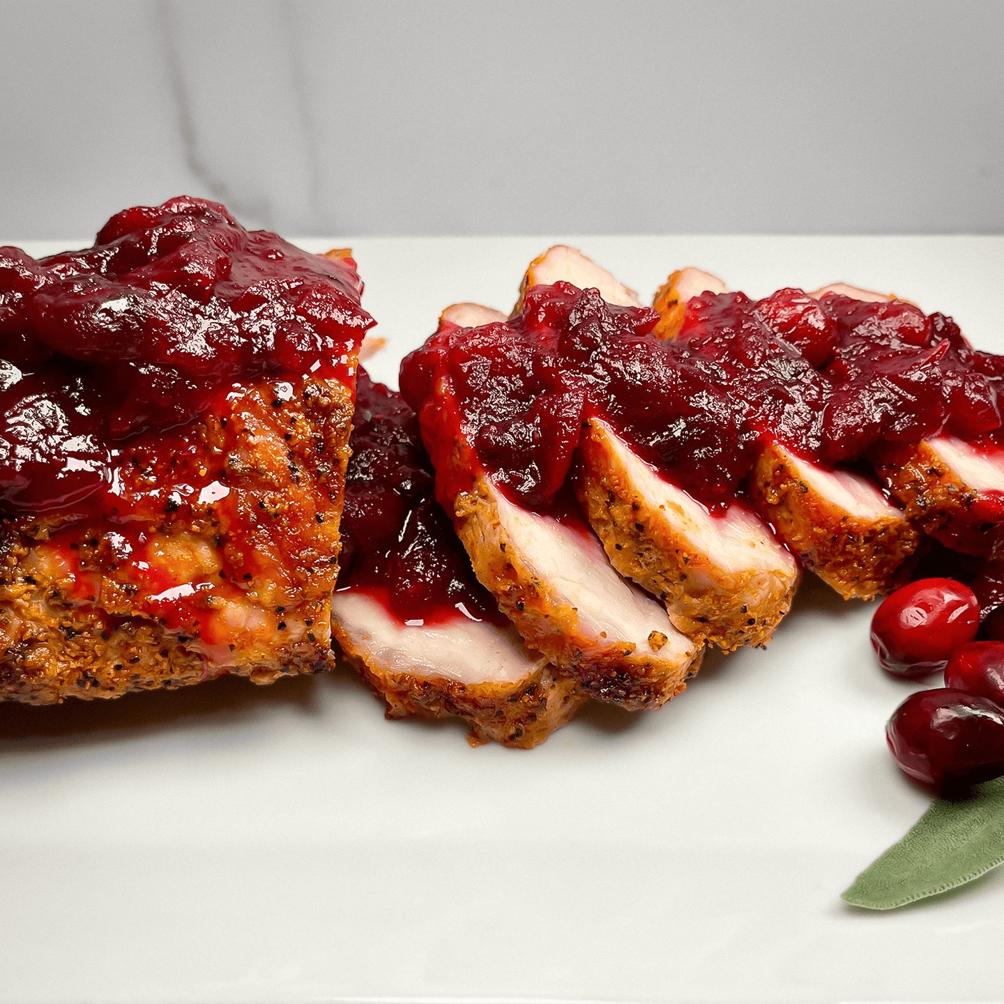 DIJON SPICED PORK LOIN WITH JALAPEÑO CRANBERRY SAUCE