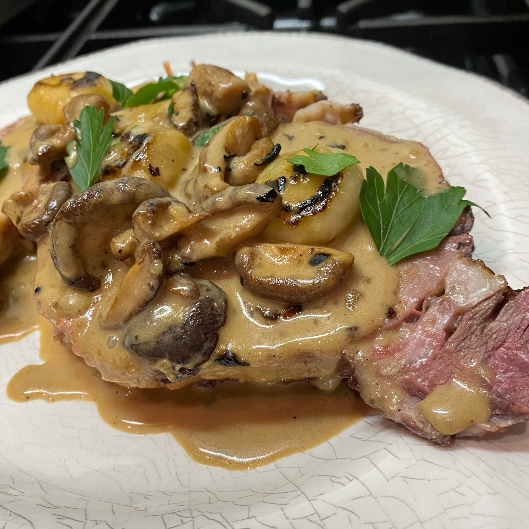 BONE IN PRIME RIB WITH OYSTER MUSHROOM BUTTER & CIPOLLINI ONION-OYSTER MUSHROOM SAUCE