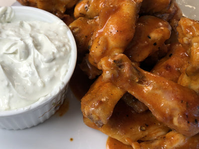 SPICY TAPATIO BUFFALO WINGS WITH BLUE CHEESE DIPPING SAUCE