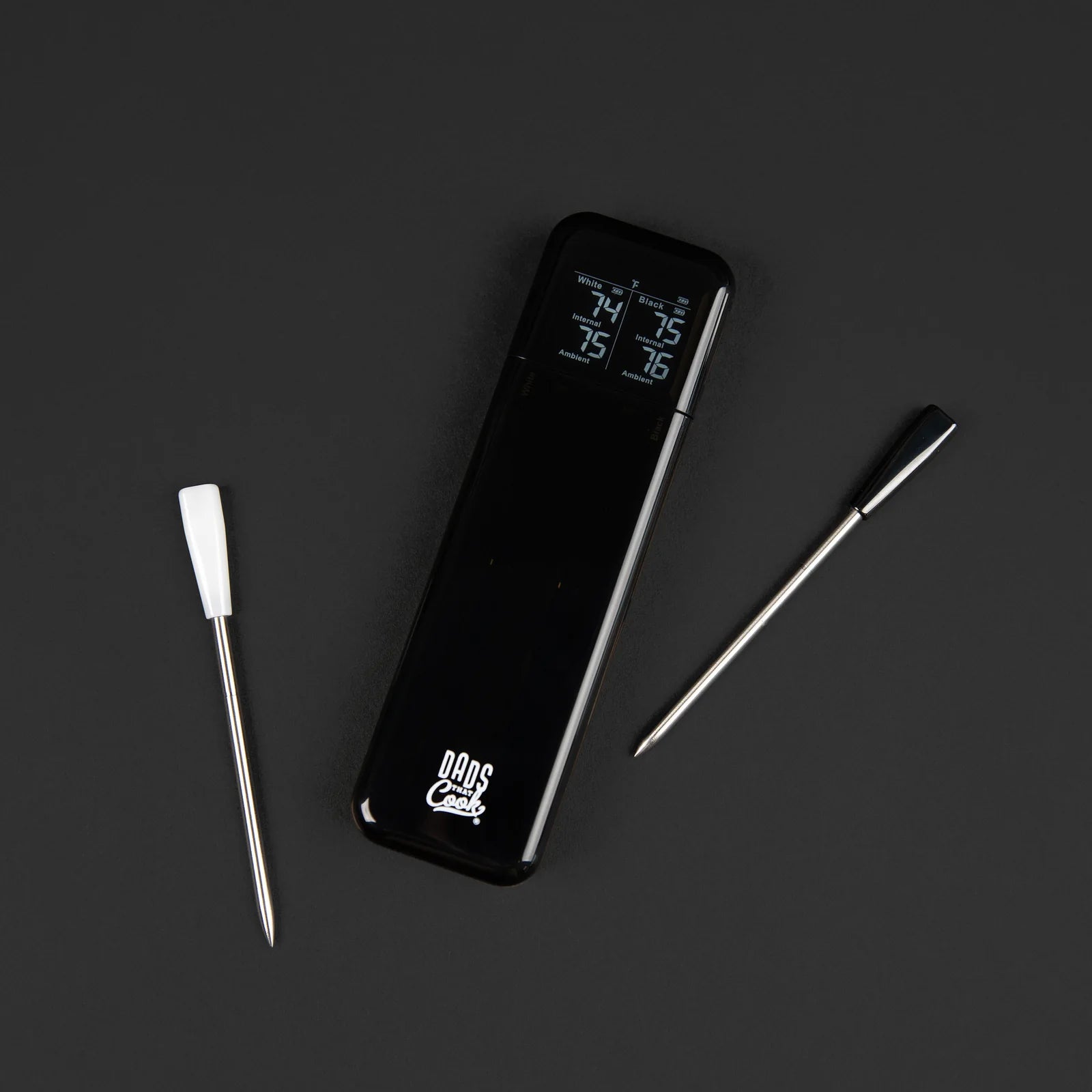Dads That Cook Smart Wireless Meat Probes with two probes and charging dock on a dark background